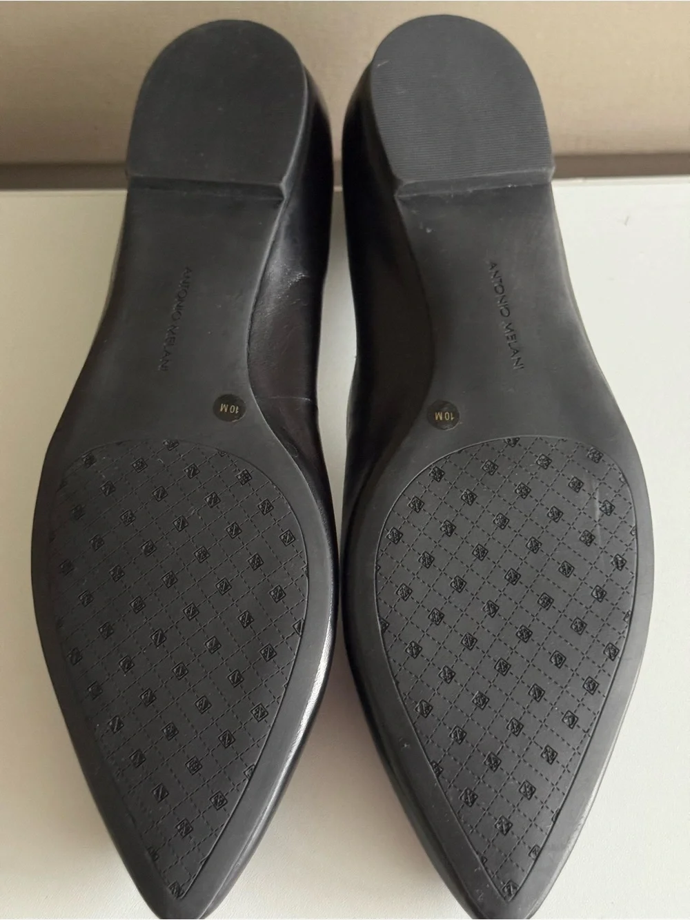 ANTONIO MELANI Black Leather Pointed-Toe Flats with Gold Chain Accent